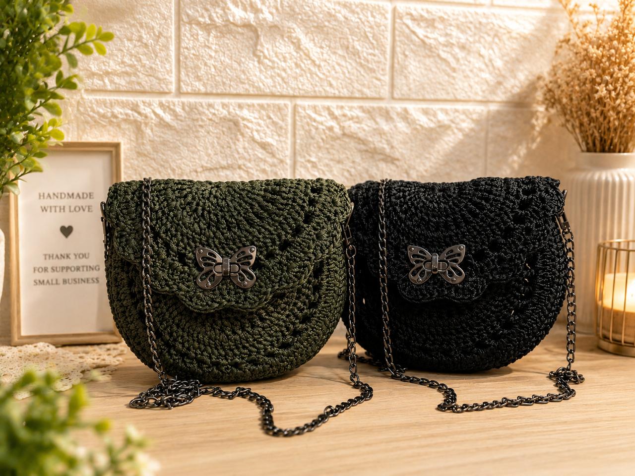 Olive green and black butterfly crochet bags displayed together