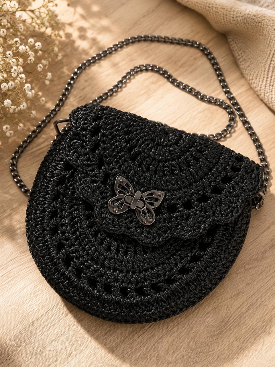 Black handcrafted crochet butterfly bag with metal chain strap